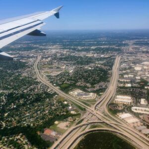 Texas, U.S - April 4, 2024 - The aerial view of the highway and the city of Austin from the plane